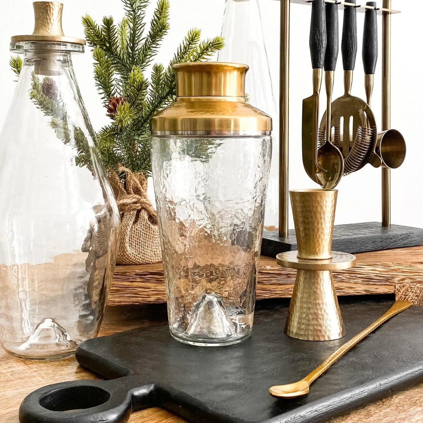 PEBBLED GLASS AND HAMMERED METAL COCKTAIL SHAKER